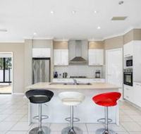 Central Gold Coast Large Modern Elevated Home - Accommodation Search