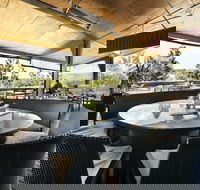 Pacific Pines Tavern - Accommodation Search