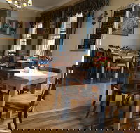 Madame M cafe - Accommodation Search