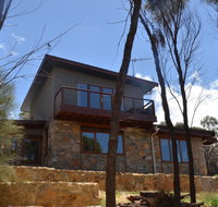 Of Stone and Wood Guesthouse - Accommodation Search