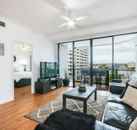 Modern 2 Bedroom River View Apartment in Docklands - Accommodation Search