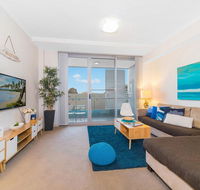 Near Airport  Train Station Stylish Two-Story Apartment - Accommodation Search