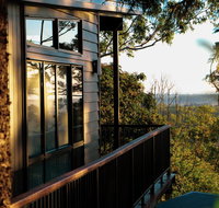 Rainforest Gardens - Luxury Hillside Chalets with Views to Bay  Islands - Accommodation Search