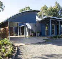 Corrugated Cottage - Accommodation Search