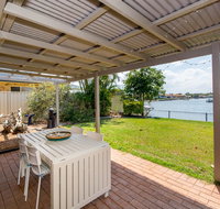Lowset home on the canal - Dolphin Dr Bongaree - Accommodation Search