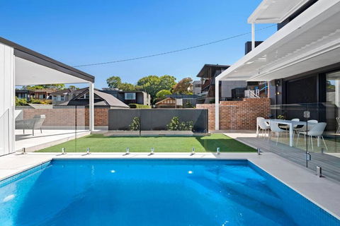 Luxury NEW 5BDRM Oasis With Heated Pool - Accommodation Search 0